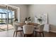 Dining area boasts an outdoor view and offers a grilling area and a pool at 13822 Destin Beach Ln, Orlando, FL 32827