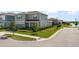 Two-story home boasts meticulous landscaping, lush green grass, and a charming curb appeal at 13822 Destin Beach Ln, Orlando, FL 32827