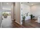 Laminate flooring leading to a screened outdoor patio at 13822 Destin Beach Ln, Orlando, FL 32827