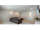 Inviting upstairs living area is spacious with a comfortable sectional couch and neutral colors at 13822 Destin Beach Ln, Orlando, FL 32827