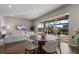 Bright living room with a large sectional sofa and sliding glass doors opening to the outdoor area at 13822 Destin Beach Ln, Orlando, FL 32827