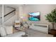Inviting living room featuring a comfortable seating arrangement and modern decor, perfect for relaxing or entertaining guests at 13822 Destin Beach Ln, Orlando, FL 32827