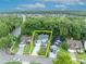 Property Lines - This aerial view shows the generous lot and the home's setting within a lush community at 1576 Crosswind Cir, Orlando, FL 32825