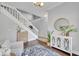 Inviting entry with staircase and hardwood floors at 1576 Crosswind Cir, Orlando, FL 32825