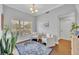 Inviting living room with hardwood floors, natural light, and comfortable seating at 1576 Crosswind Cir, Orlando, FL 32825