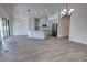 Bright kitchen boasting an island, stainless steel appliances, and an adjacent living area at 1727 Butterfly Way, Longwood, FL 32750