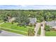 Beautiful home showcasing lush landscaping and a driveway, creating a serene curb appeal at 1745 Seneca Blvd, Winter Springs, FL 32708