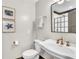 Bathroom featuring a vanity, toilet, sink, and natural lighting at 1745 Seneca Blvd, Winter Springs, FL 32708