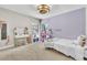 Cozy bedroom with a charming vanity and a soft color scheme at 1745 Seneca Blvd, Winter Springs, FL 32708
