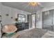 Bedroom with chandelier lighting, and neutral color palette at 1745 Seneca Blvd, Winter Springs, FL 32708