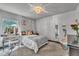 Bedroom featuring a vanity, bed, chandelier, and neutral color palette at 1745 Seneca Blvd, Winter Springs, FL 32708