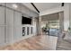 Media room featuring custom built-ins, TV, and a comfortable lounge area with pool view at 1745 Seneca Blvd, Winter Springs, FL 32708