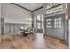 Elegant dining room with hardwood floors, high ceilings, and modern light fixture at 1745 Seneca Blvd, Winter Springs, FL 32708