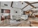 Bright living room boasts a wet bar, comfortable seating, and seamless access to the gourmet kitchen at 1745 Seneca Blvd, Winter Springs, FL 32708