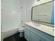 Bright bathroom featuring white subway tile in shower and modern vanity with quartz countertop at 215 Hollowbrook Cir, Daytona Beach, FL 32114