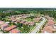 This is an aerial image of a neighborhood, with lush grass, sidewalks, and mature landscaping at 2325 Bella Luna Cir, Lakeland, FL 33810