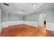 Spacious finished basement with hardwood floors, chair railing, and recessed lighting at 2325 Bella Luna Cir, Lakeland, FL 33810