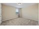 Bedroom featuring plush carpet, natural light, and neutral paint at 2325 Bella Luna Cir, Lakeland, FL 33810