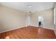 Spacious room with wood floors, neutral walls, and natural light at 2325 Bella Luna Cir, Lakeland, FL 33810