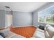 Bright living area with wood floors, natural light, and a neutral color scheme creating an inviting space at 2325 Bella Luna Cir, Lakeland, FL 33810