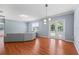 Bright and airy living room with hardwood floors and natural light from the french doors at 2325 Bella Luna Cir, Lakeland, FL 33810