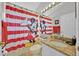 Bathroom with a Mickey Mouse-themed shower curtain and a granite countertop at 2627 Autumn Creek Cir, Kissimmee, FL 34747