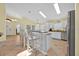 Kitchen showcasing granite countertops, stainless appliances, a breakfast bar and a breakfast nook at 2627 Autumn Creek Cir, Kissimmee, FL 34747