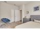 Cozy bedroom with carpet, closet, and small dresser at 2793 Nature View Rd, St Cloud, FL 34771