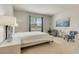 Bright bedroom with natural light, a large window, and stylish chairs at 2793 Nature View Rd, St Cloud, FL 34771