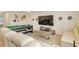 Spacious game room with a pool table, large TV, and comfortable seating area at 2793 Nature View Rd, St Cloud, FL 34771
