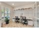 Bright home office featuring dual workstations, stylish decor, and natural light at 2793 Nature View Rd, St Cloud, FL 34771