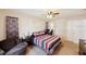 Bedroom featuring a ceiling fan and a large window at 2822 Fulford St, Deltona, FL 32738