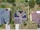Aerial view of the property, showcasing its location within a community and its solar panels at 2860 Orange Haven Way, Kissimmee, FL 34746