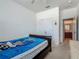 This bedroom is well lit, featuring carpet flooring and a large closet at 2860 Orange Haven Way, Kissimmee, FL 34746