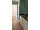 Bathroom with granite countertop vanity, tile floors, and a tub at 30965 E Thyme Ave, Eustis, FL 32736