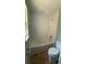 Bright bathroom featuring a toilet and shower at 30965 E Thyme Ave, Eustis, FL 32736