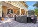 Spacious backyard patio with comfortable seating on a covered patio, perfect for outdoor entertaining at 33919 Terragona Dr, Sorrento, FL 32776