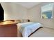 Cozy bedroom featuring a comfortable bed, neutral walls, and ample natural light at 33919 Terragona Dr, Sorrento, FL 32776