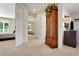Hallway with natural light entering into an open layout from the bedroom on the left at 33919 Terragona Dr, Sorrento, FL 32776