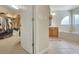 This main bathroom has a large soaking tub, perfect for relaxing after a long day, and dual sinks at 33919 Terragona Dr, Sorrento, FL 32776