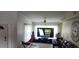 Cozy living room featuring lots of light, and a unique, modern aesthetic at 3600 Fountainbleu Blvd, Kissimmee, FL 34746