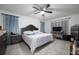Spacious main bedroom featuring tile flooring, fan, and closet at 3600 Fountainbleu Blvd, Kissimmee, FL 34746