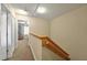 Second floor landing view with carpeted floors and access to bedrooms at 3725 Calabria Ave, Davenport, FL 33897
