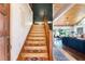 View of the entryway stairs and open living room beyond at 4055 State Road 11, Deland, FL 32724