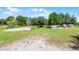 Open pasture with small structures at 4055 State Road 11, Deland, FL 32724
