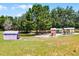 Various colored sheds in a grassy yard at 4055 State Road 11, Deland, FL 32724