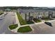 Exterior aerial showcases new townhomes with parking and landscaped common areas at 4184 Paragraph Dr, Kissimmee, FL 34746