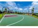 Outdoor basketball court with water slide in the background, perfect for active community living at 4184 Paragraph Dr, Kissimmee, FL 34746