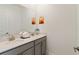 Bathroom with double vanity, clean lines, and modern fixtures at 4184 Paragraph Dr, Kissimmee, FL 34746