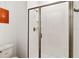 Modern shower design in bathroom with clear glass doors at 4184 Paragraph Dr, Kissimmee, FL 34746